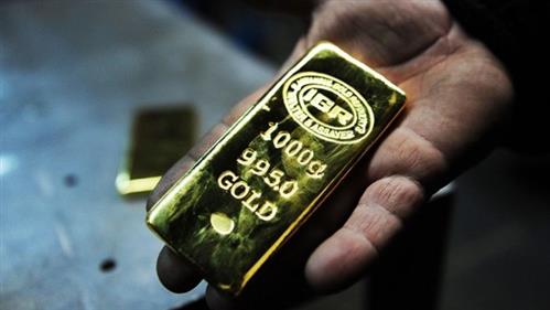 Đồng USD mạnh lên, gây sức ép với thị trường vàng thế giới