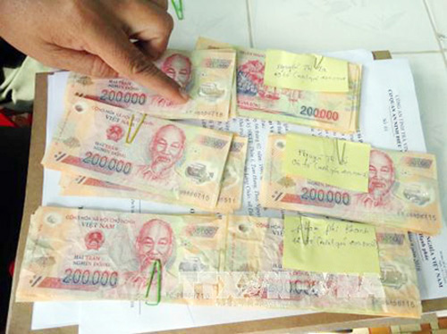 Phá đường dây đưa tiền giả từ Trung Quốc về Việt Nam tiêu thụ, khởi tố 7 đối tượng