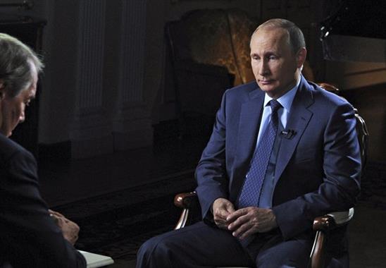 Putin: “Sao tôi có thể là găngxtơ nếu từng làm việc cho KGB”