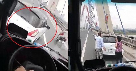 Clip: Nữ tài xế lái ô tô tạt đầu xe khách kiểu 'cảm tử' trên cầu Nhật Tân