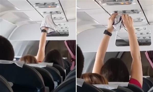 Hành khách thản nhiên hong đồ lót trên máy bay