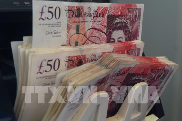 Đồng bảng Anh mất giá có thể kéo lạm phát và lãi suất lên cao hơn