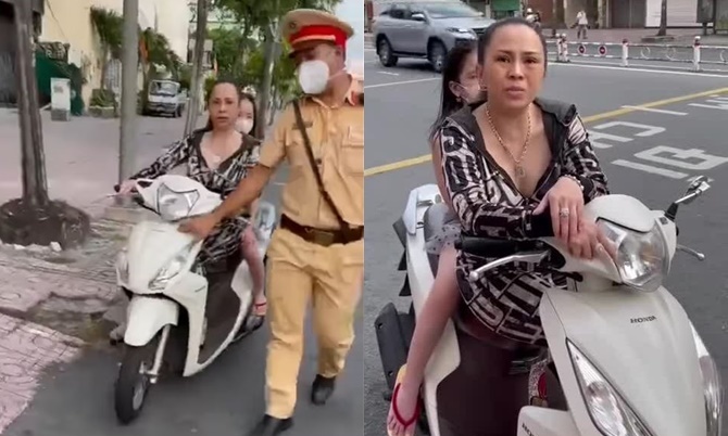 Người phụ nữ không đeo khẩu trang lý sự với cảnh sát giao thông