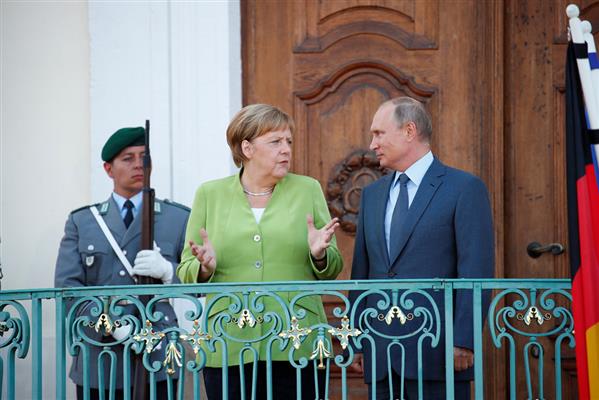 Putin và Merkel chuyển hướng thực dụng sau nhiều năm căng thẳng