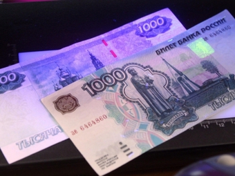 Người Nga ngày càng lười kiểm tra tiền thật, giả