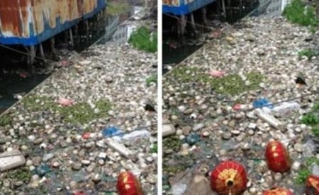 Trung Quốc: Doanh nhân thách quan chức bơi qua sông ô nhiễm