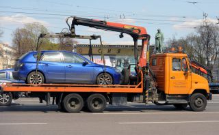 Moskva: Chủ xe phải trả tiền di dời xe từ ngày 15-9-2013